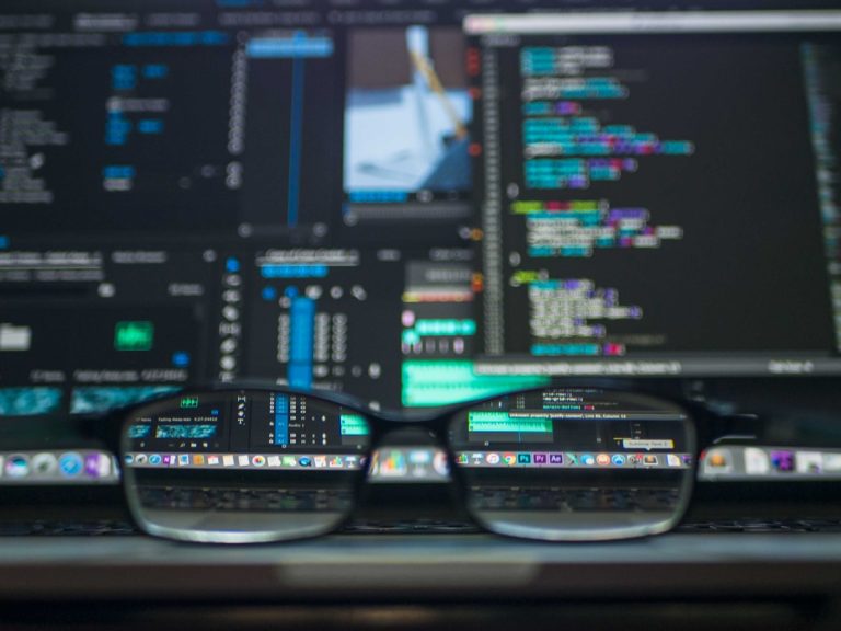 Oracle Cut 21,000 Jobs in a Year, Admits AI Replaced Some Roles Oracle AI layoffs featured image showing AI technology replacing jobs