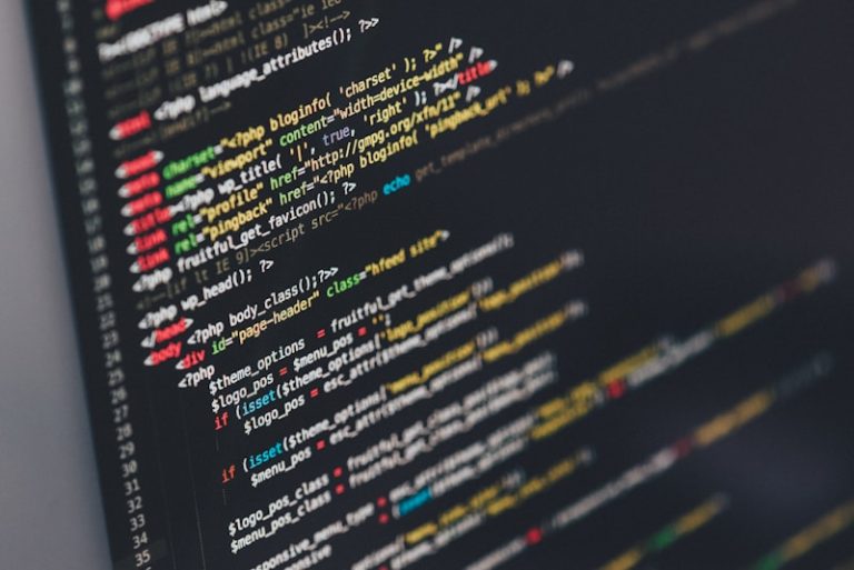 Developer Rates Keep Rising Despite AI Coding Tools, Lemon.io Data Shows Software developer coding programming workspace