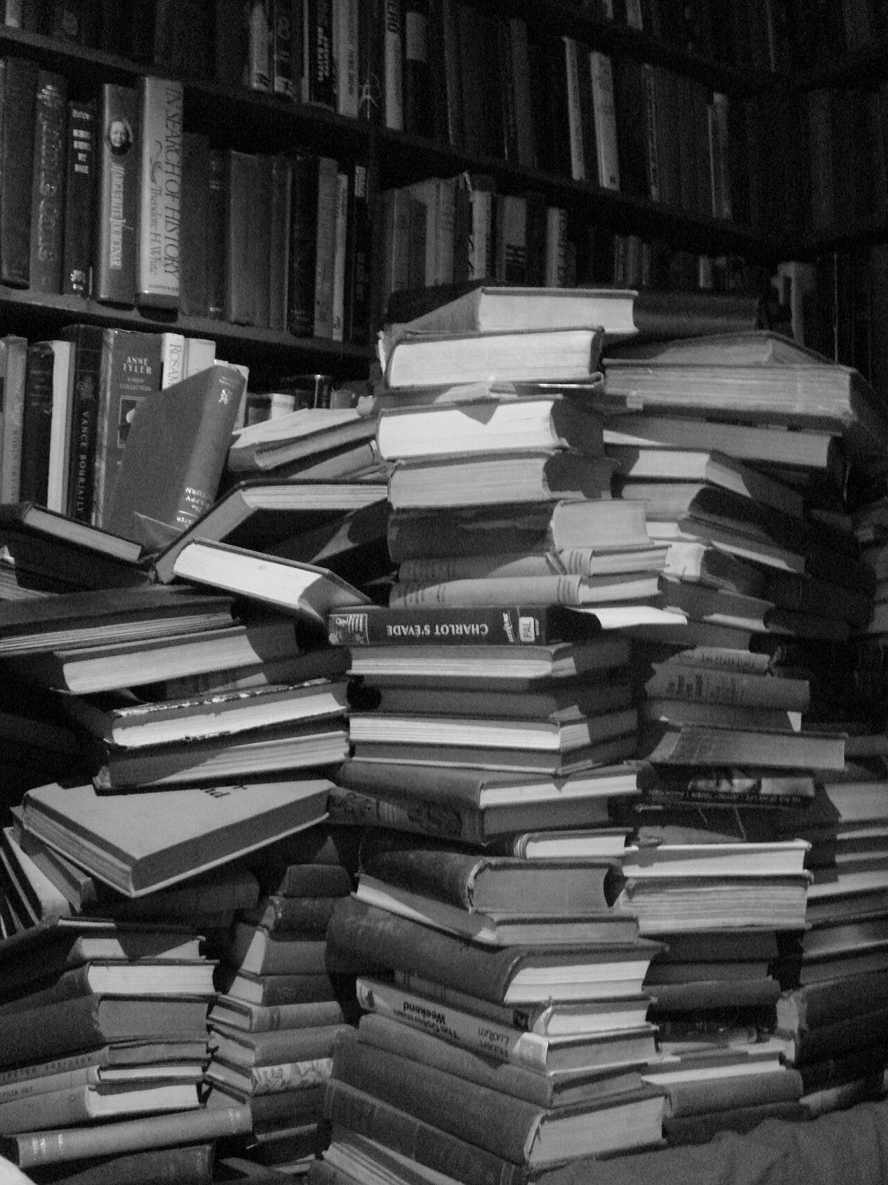 Stack of books ready to be tracked in a reading app