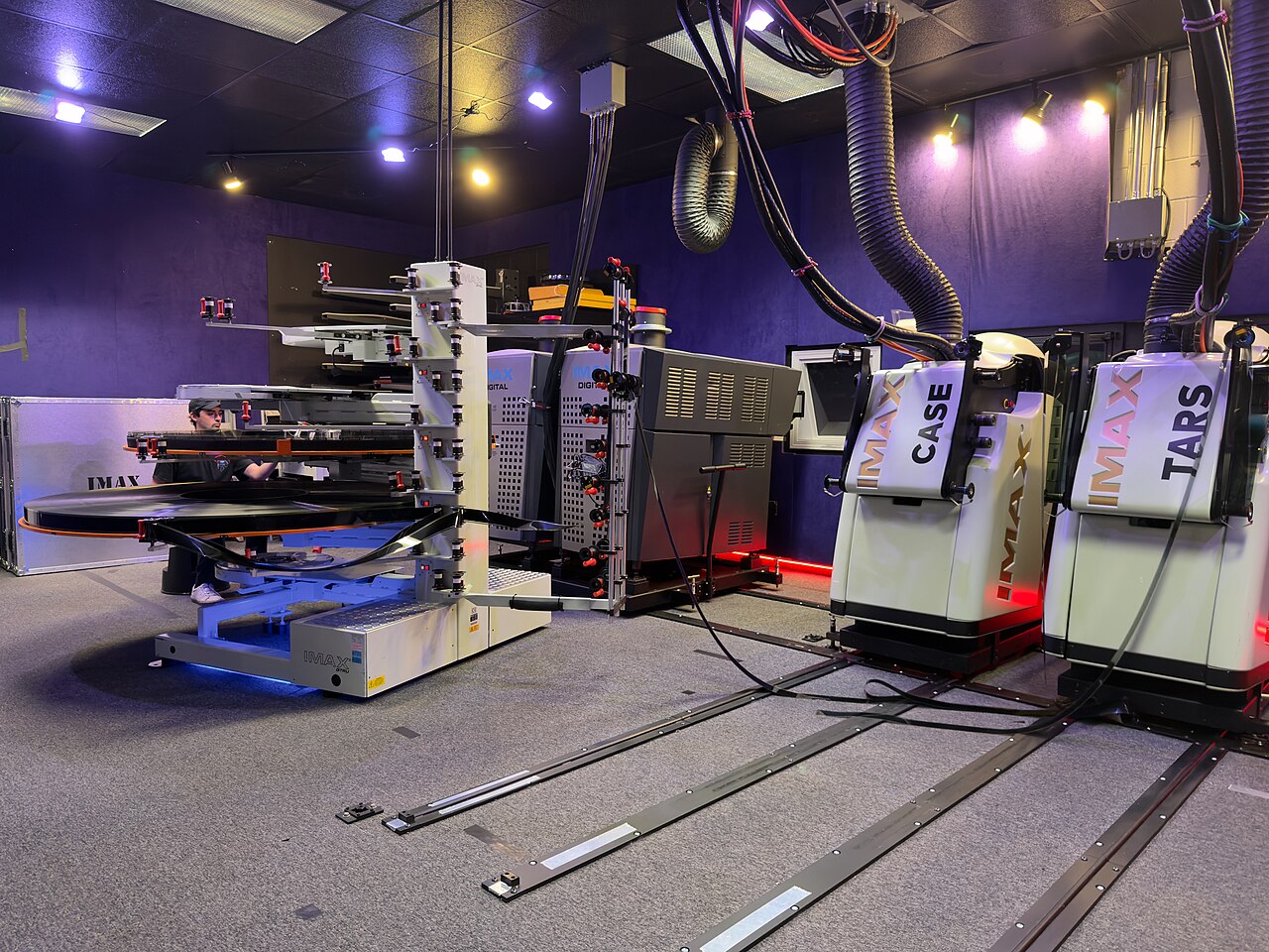IMAX 70 mm film reels of The Odyssey at a cinema