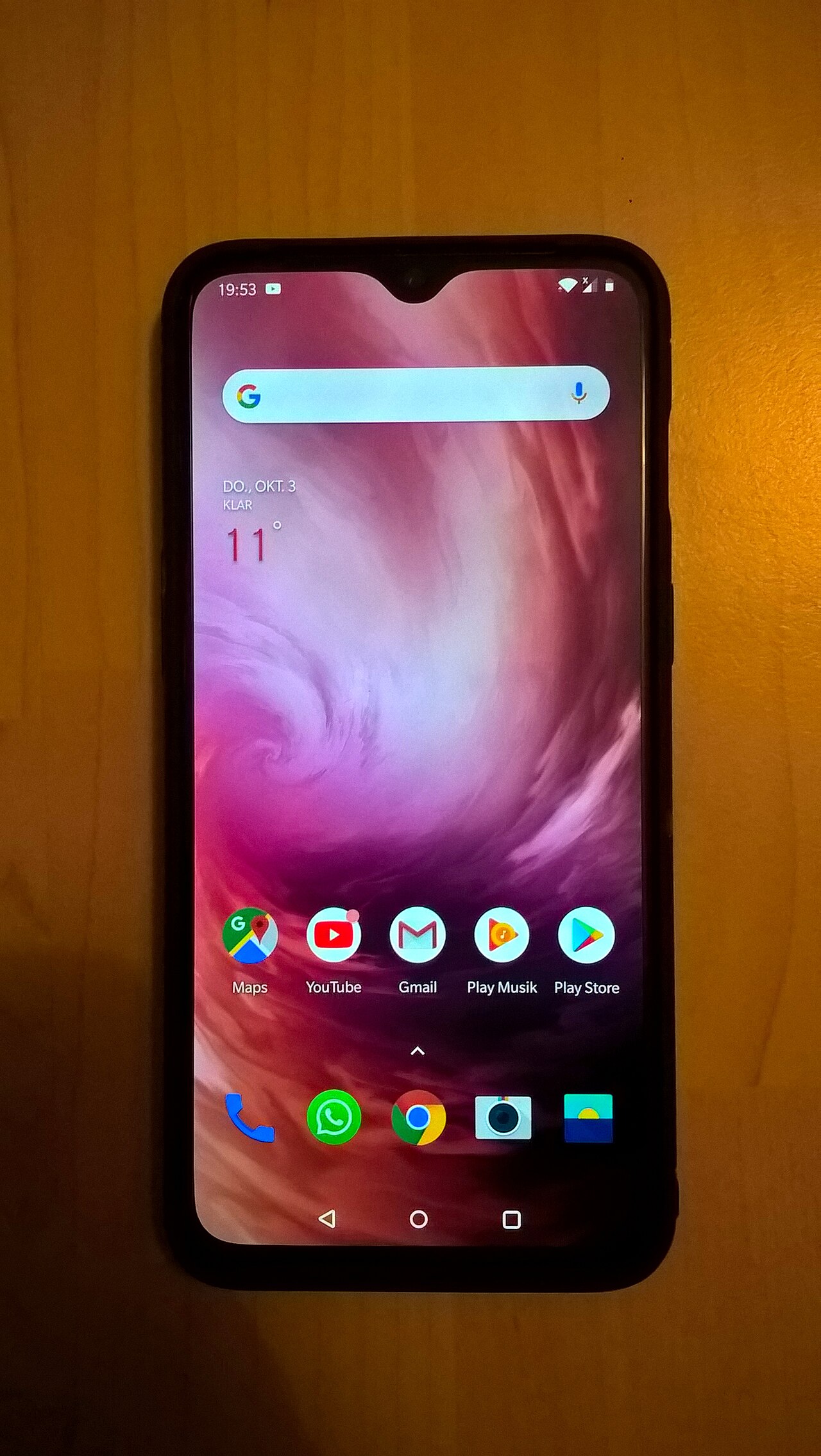 OnePlus smartphone running OxygenOS era software